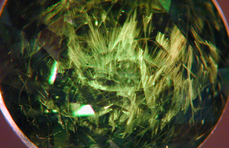 Demantoid Garnet photomicrograph image