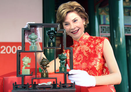 Laura Bush Examines Fuwa photoshop image