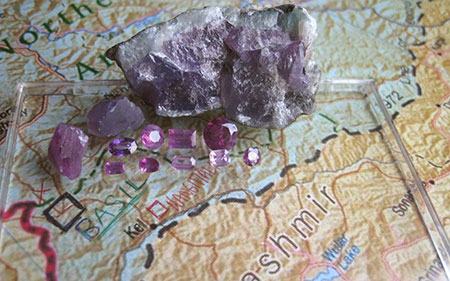 Rough and Cut Purple Sapphires on Map photo image